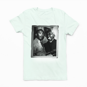 A ROCKaBLOCK "I Met Dr. King" graphic tee featuring marting Luther King Jr.  and  Cearance the barber from Coming to America.