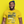 Load image into Gallery viewer, Man wearing a yellow ROCKaBLOCK "What The Hali?" t-shirt with a retro 8-bit video game inspired graphic design on a yellow background