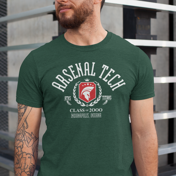 Man wearing a green t-shirt with 'Arsenal Tech' design against a metallic background