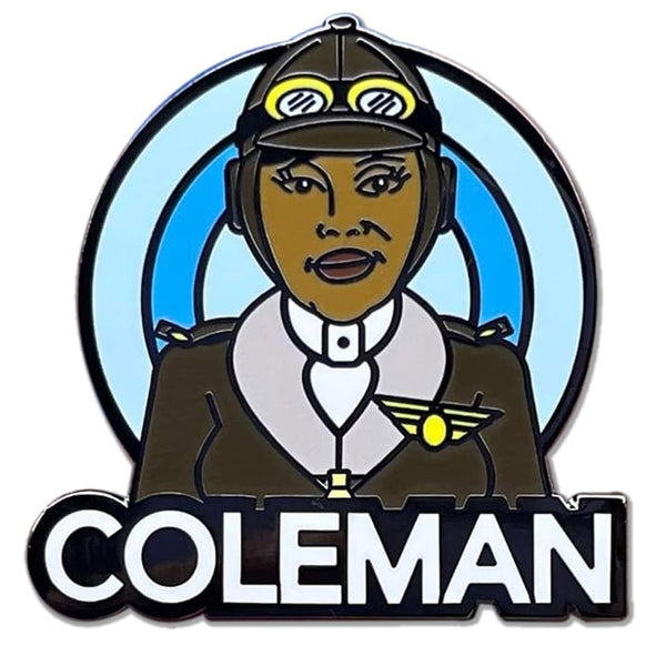 ROCKaBLOCK hard enamel Pioneers pins with characters including Bessie Coleman, Bass Reeves, 'Stagecoach' Mary Fields, Jean Baptiste Point Du Sable, Mary Seacole, and Matthew Henson, secured on a denim fabric. Highlighting Black history.