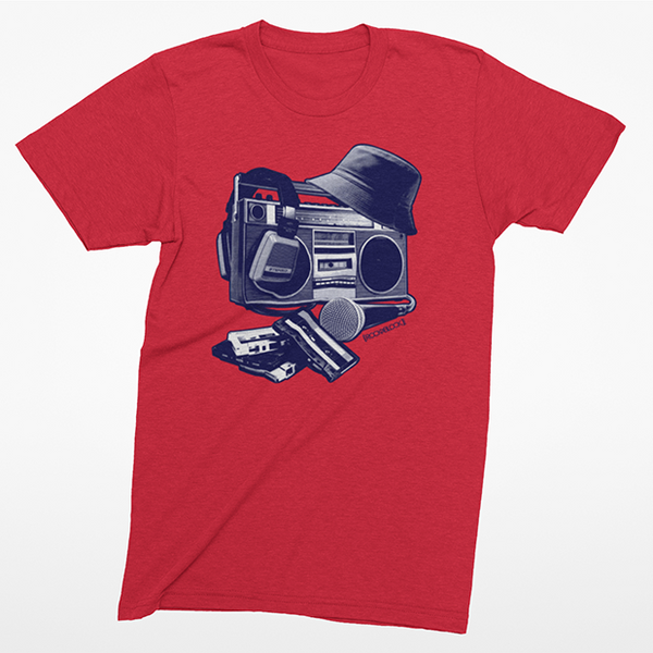 A red heather short-sleeve t-shirt with a graphic print of a vintage boombox, hat, and sunglasses on the front, displayed against a light gray background.