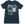 Load image into Gallery viewer, A dark navy blue short-sleeve t-shirt with a large graphic print on the front. The graphic is a black and white collage featuring a toddler in a white diaper wearing headphones, a speaker, and a milk crate.
