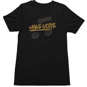 A black short-sleeve crewneck t-shirt featuring a graphic on the chest with the words 'MAKE NOISE' in a distressed gold font and a dark gray music note design behind it, shown against a plain white background.